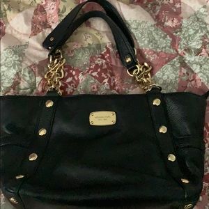 Michael Kors black leather bag.